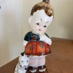 Little girl and dog figurine